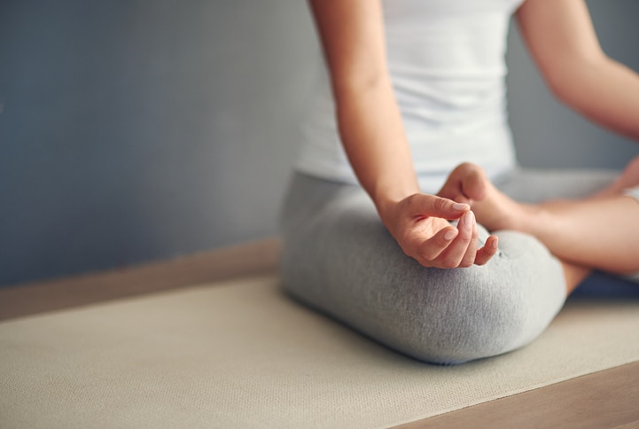 Cropped shot of a young woman practicing yogahttp://195.154.178.81/DATA/i_collage/pi/shoots/806303.jpg