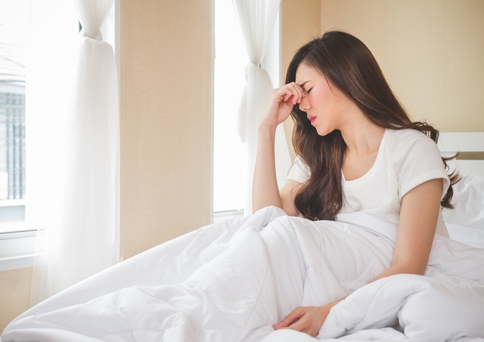 Young beautiful asian woman headache on white bed, sad, migraine stressed, crying, disappointed feeling in the morningYoung beautiful asian woman headache on white bed, sad, migraine stressed, crying, disappointed feeling in the morningYoung beautiful asian woman headache on white bed, sad, migraine stressed, crying, disappointed feeling in the morning