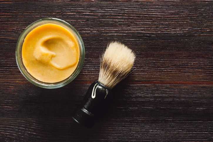 Men's Shaving Tools - Soap and Brush on Dark Table with Space for Copy