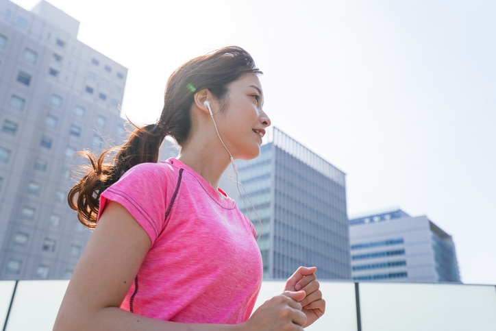 Woman running in the city